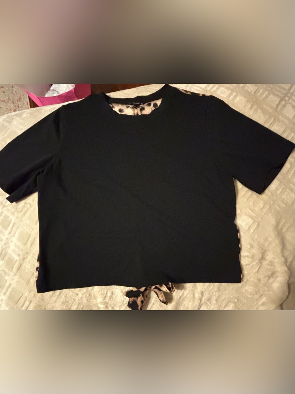 Express Black Short Sleeve Tee with Leopard Trim on the back with tie adds flare